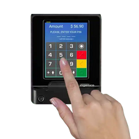 Ingenico payment terminal with keypad and touchscreen for secure transactions