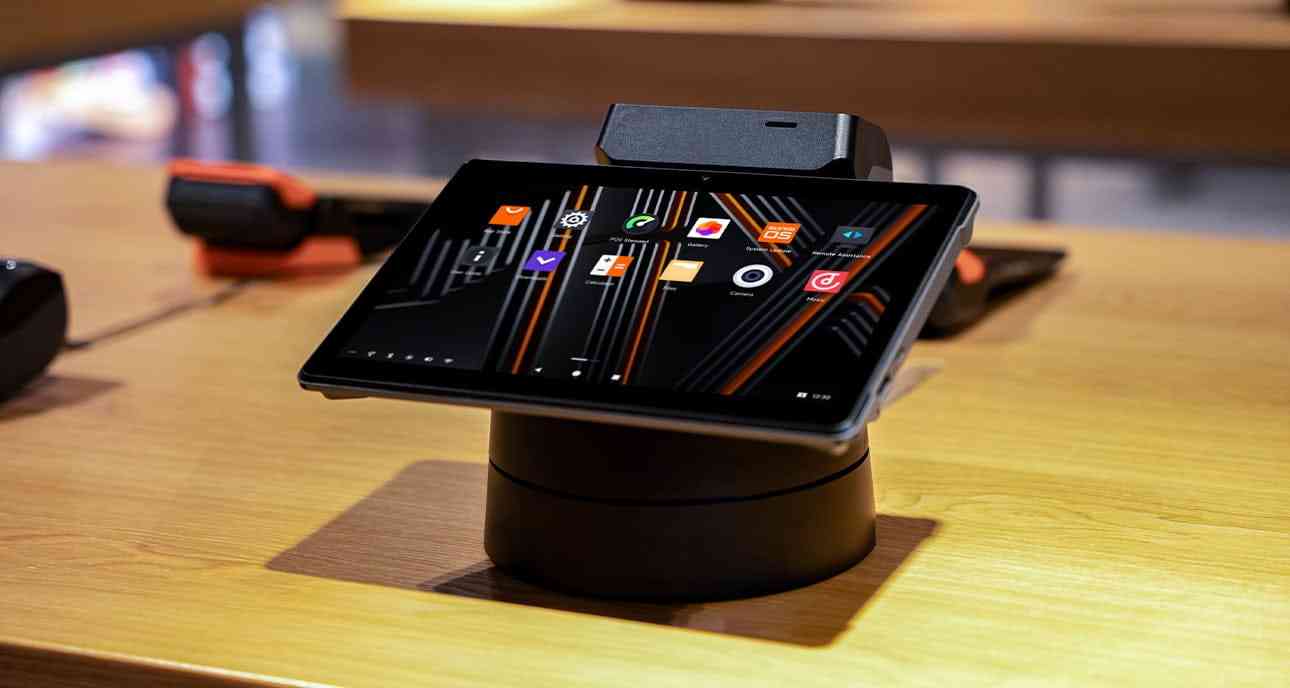 SUNMI V3 MIX Android POS tablet with printer on a wooden table for business use