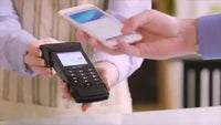 Person using Equinox 6200M Countertop Terminal for payment