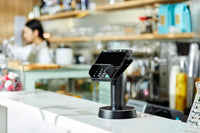 Retail checkout with PAX A30 payment device on counter